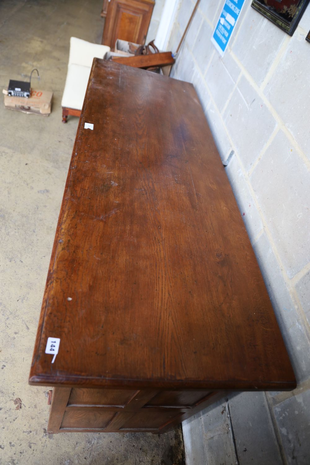 An 18th century style oak low dresser, width 168cm, depth 58cm, height 86cm